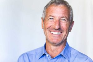 patient smiling after his dental implant procedure