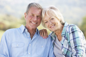 Bone Grafting And Dental Implant Patients Smiling