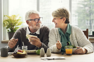 Dental Implant Patients Eating Together In San Antonio, TX