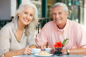 Dental Implant Patients Eating Together With Their False Teeth in San Antonio, TX