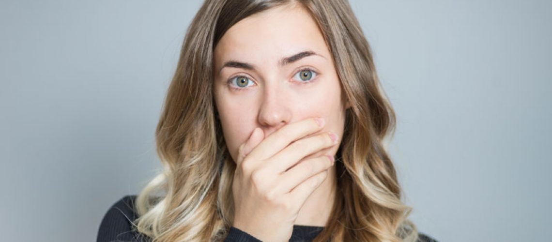 Dental Patient Hiding Her Smile