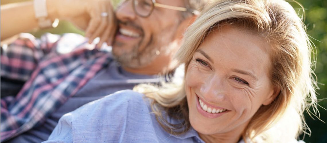 Full Arch Dental Implant Patients Smiling Together