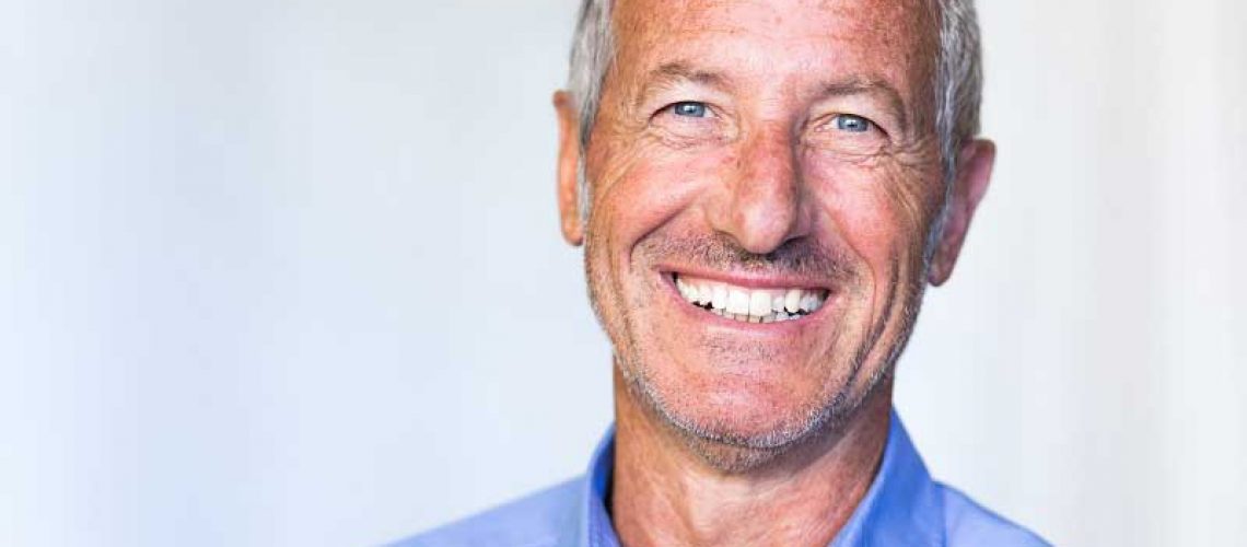 patient smiling after his dental implant procedure